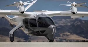 भारत में जल्द शुरू होगी एयर टैक्सी सेवा, AI समिट में पेश हुआ मॉडल; 8 मिनट में तय करेगी 36 KM