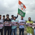 भोपाल में पानी की टंकी पर चढ़े युवा कांग्रेस कार्यकर्ता, मांगा अमित शाह का इस्तीफा