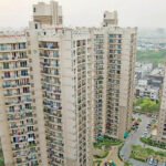सोसायटी के नियम तोड़ने पर किसे भरना होगा जुर्माना? जानिए मकान मालिक या किरायेदार, क्या कहता है नियम