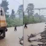 आगे लाल झंडी लेकर चला रेलकर्मी, पीछे 3 फीट पानी चीरती रही ट्रेन; सतना-मानिकपुर ट्रैक का VIDEO वायरल